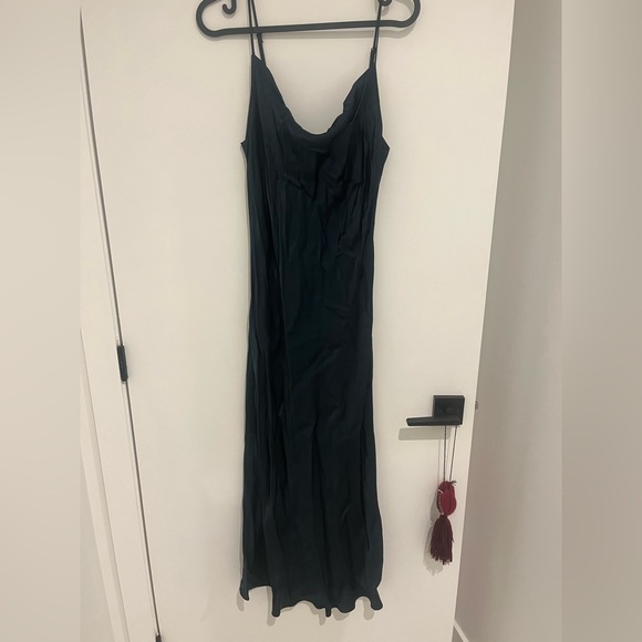 Beautiful silky cowlick dress in a dark emeraude colour. Worn a couple of times. - Picture 1 of 4